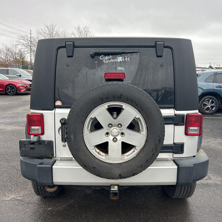 used 2010 Jeep Wrangler Unlimited car, priced at $11,995