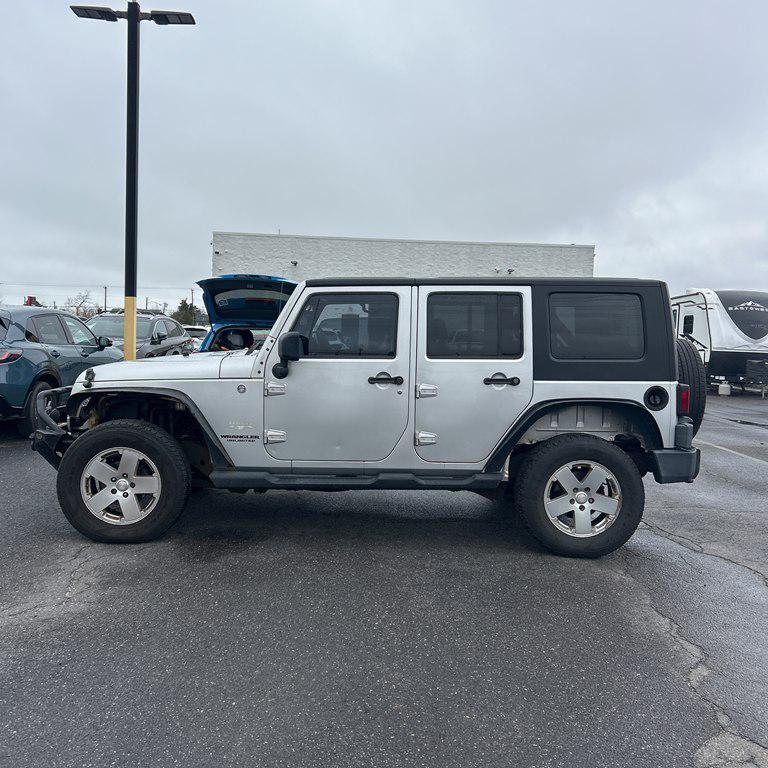 used 2010 Jeep Wrangler Unlimited car, priced at $11,995