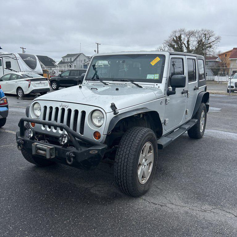 used 2010 Jeep Wrangler Unlimited car, priced at $11,995