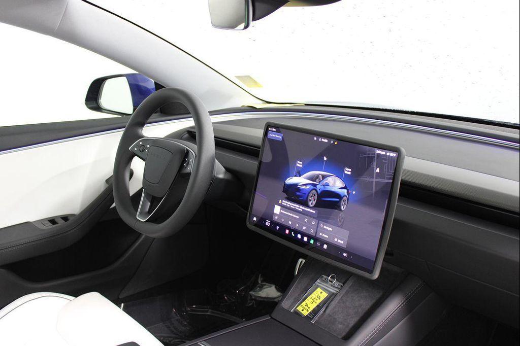 used 2025 Tesla Model 3 car, priced at $53,888