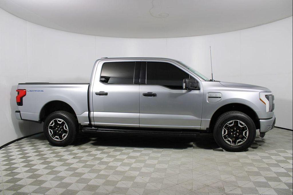 used 2023 Ford F-150 Lightning car, priced at $37,885