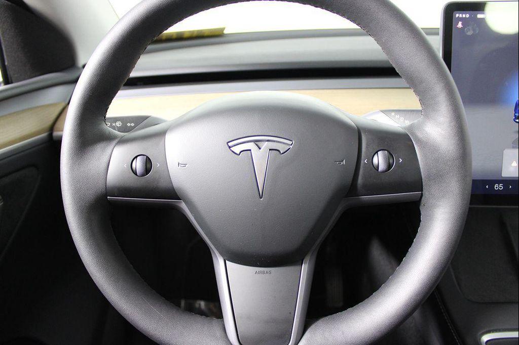 used 2023 Tesla Model Y car, priced at $30,399