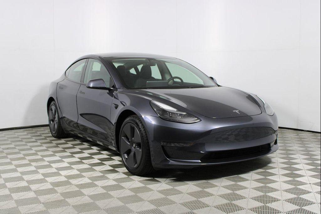 used 2023 Tesla Model 3 car, priced at $22,151