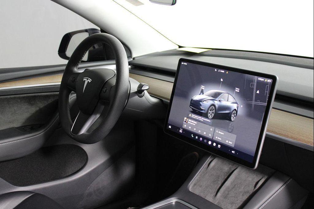 used 2024 Tesla Model Y car, priced at $33,379