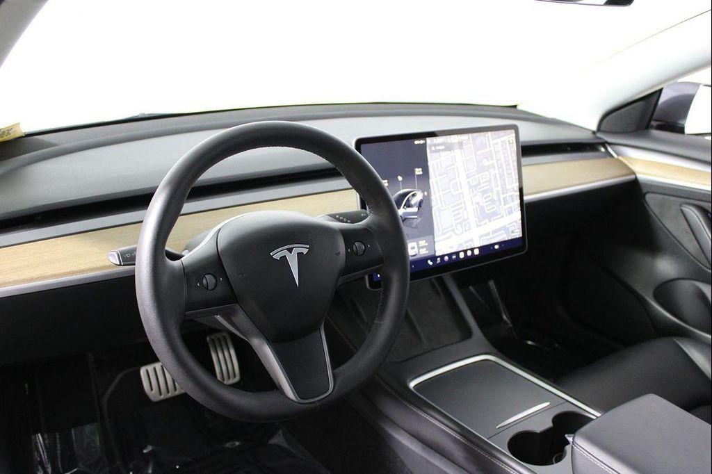 used 2023 Tesla Model 3 car, priced at $30,556