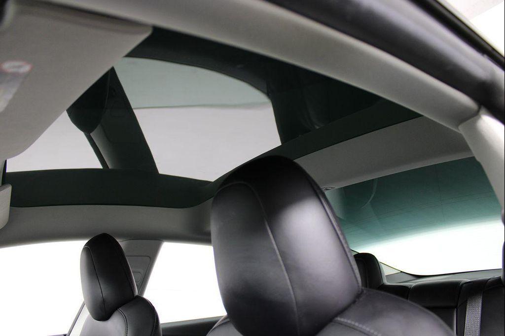 used 2023 Tesla Model 3 car, priced at $30,556