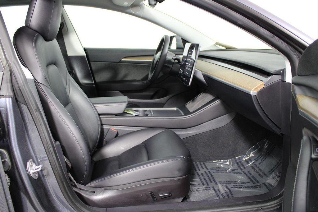 used 2023 Tesla Model 3 car, priced at $30,556