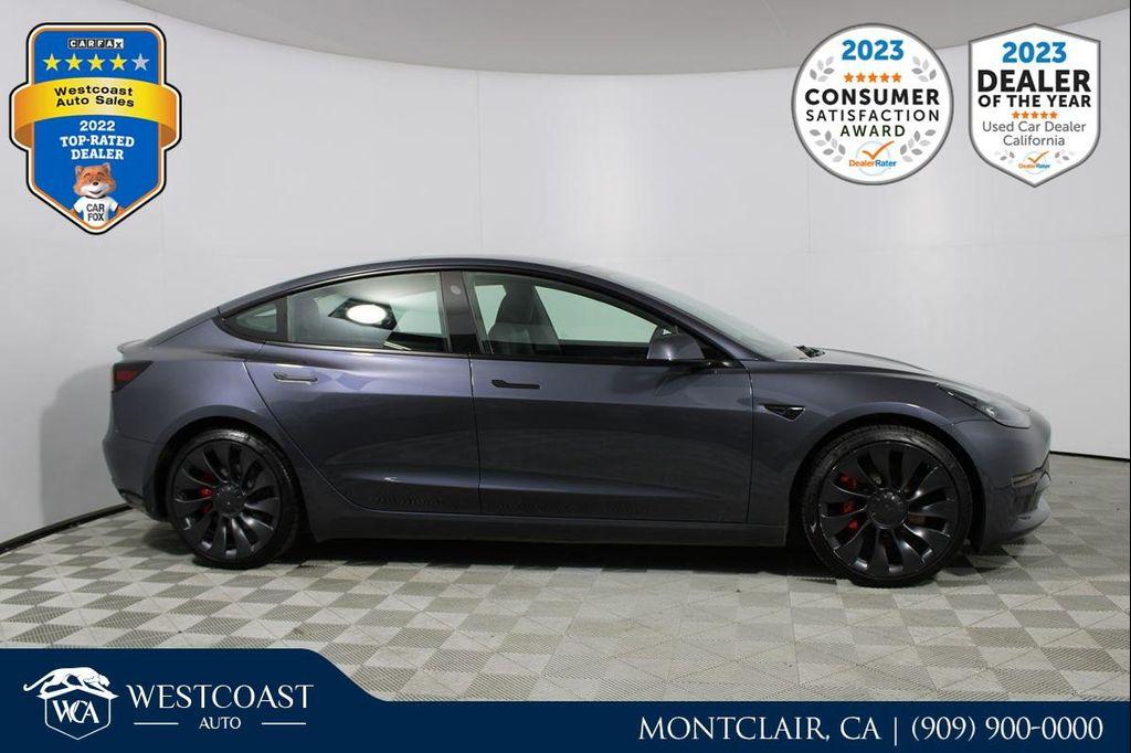 used 2023 Tesla Model 3 car, priced at $30,556