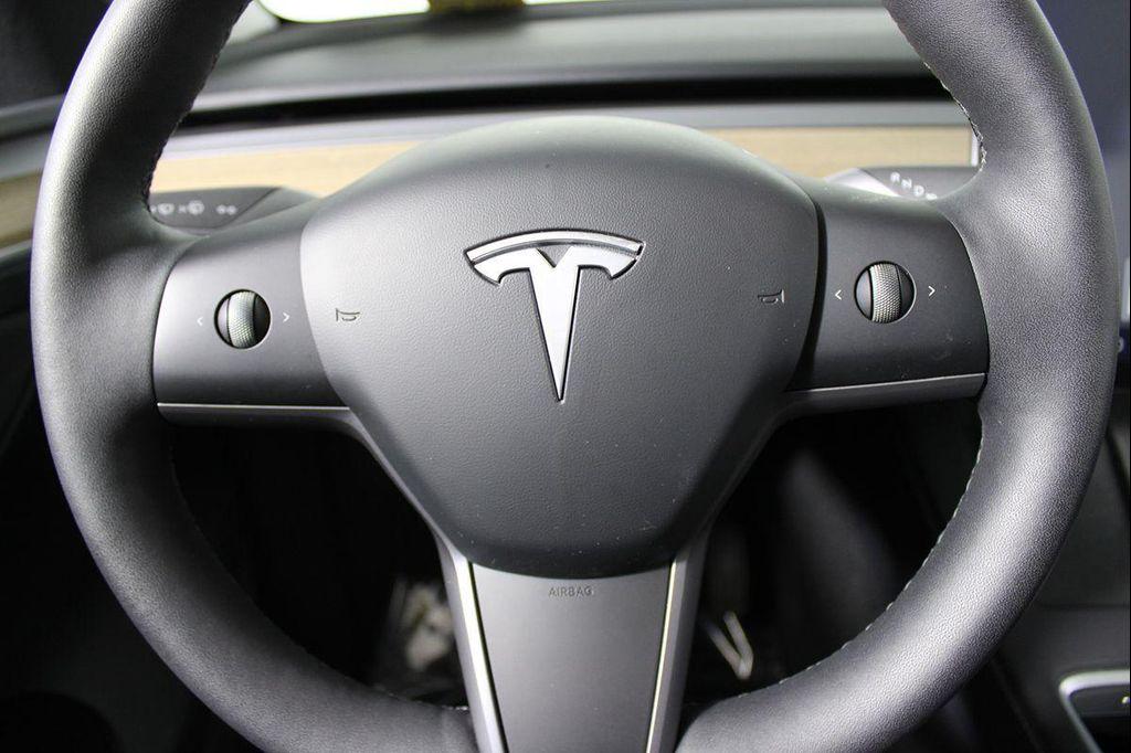 used 2025 Tesla Model Y car, priced at $38,957