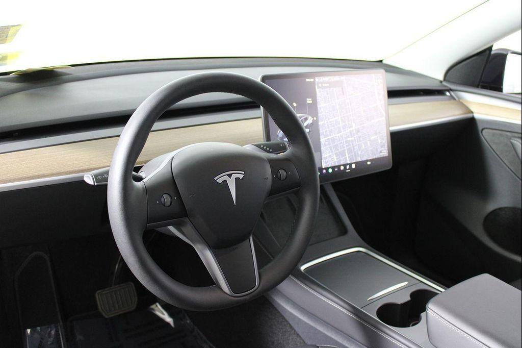 used 2025 Tesla Model Y car, priced at $38,957