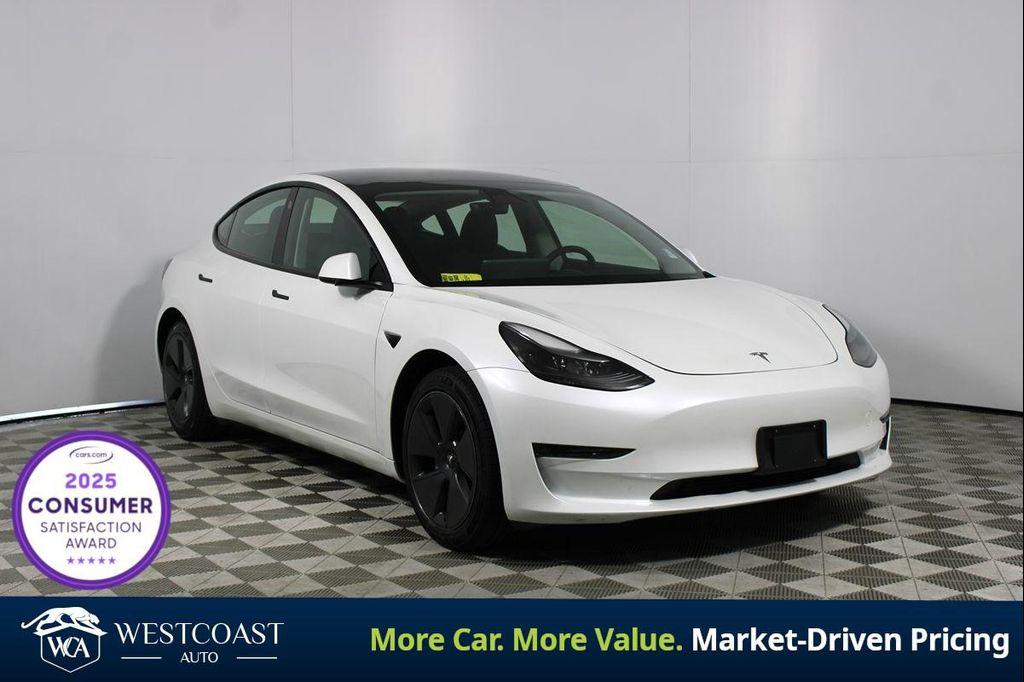 used 2023 Tesla Model 3 car, priced at $26,141