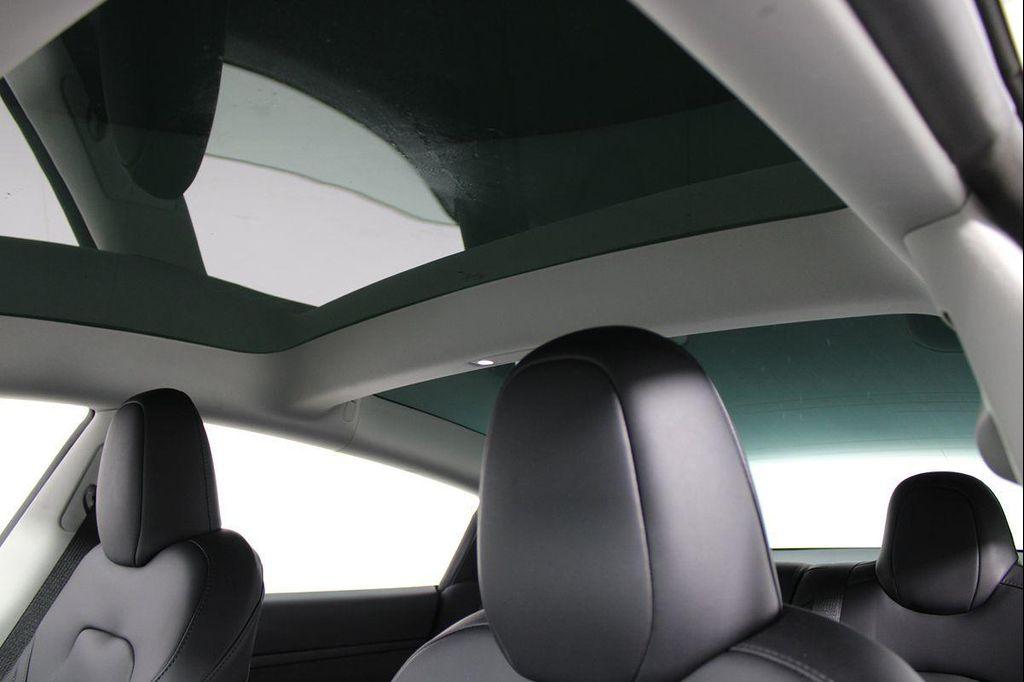 used 2023 Tesla Model 3 car, priced at $26,141
