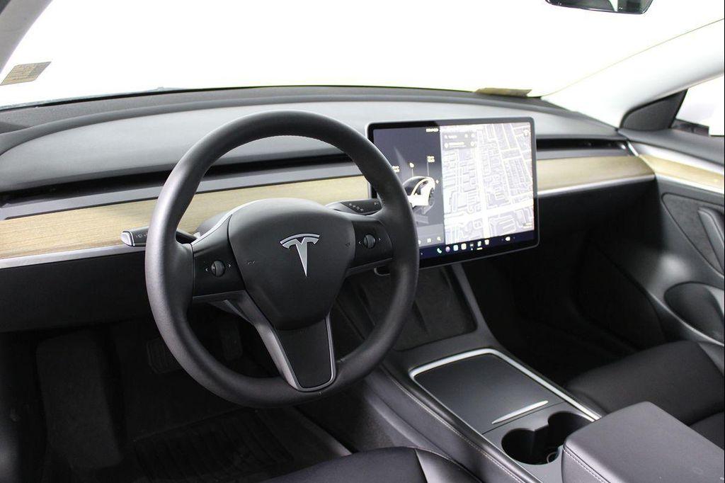 used 2023 Tesla Model 3 car, priced at $26,141