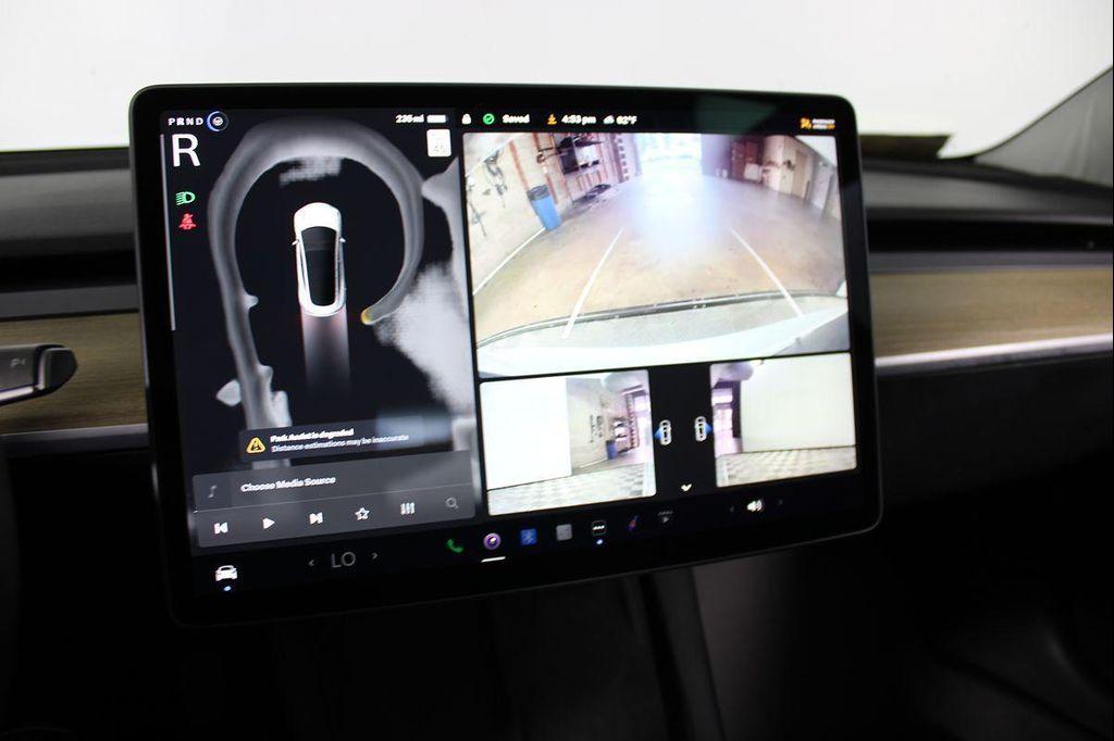 used 2023 Tesla Model 3 car, priced at $26,141