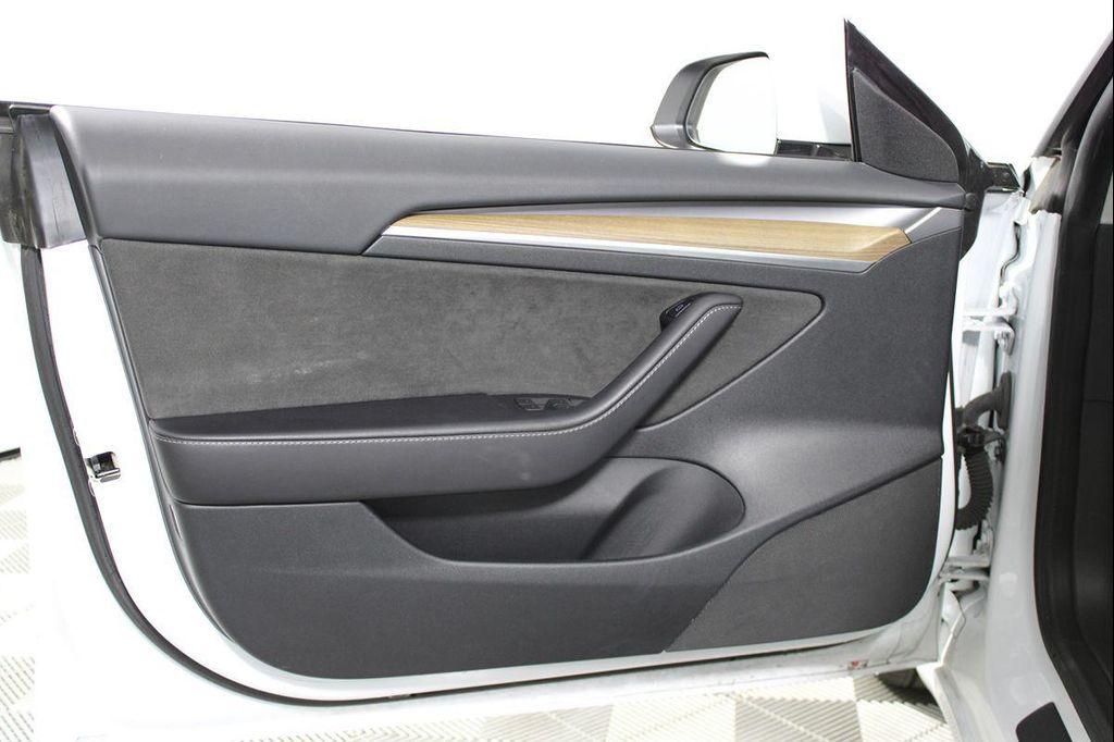 used 2023 Tesla Model 3 car, priced at $26,141