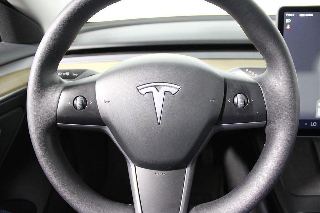 used 2023 Tesla Model 3 car, priced at $26,141