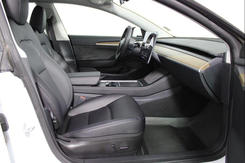used 2023 Tesla Model 3 car, priced at $26,141