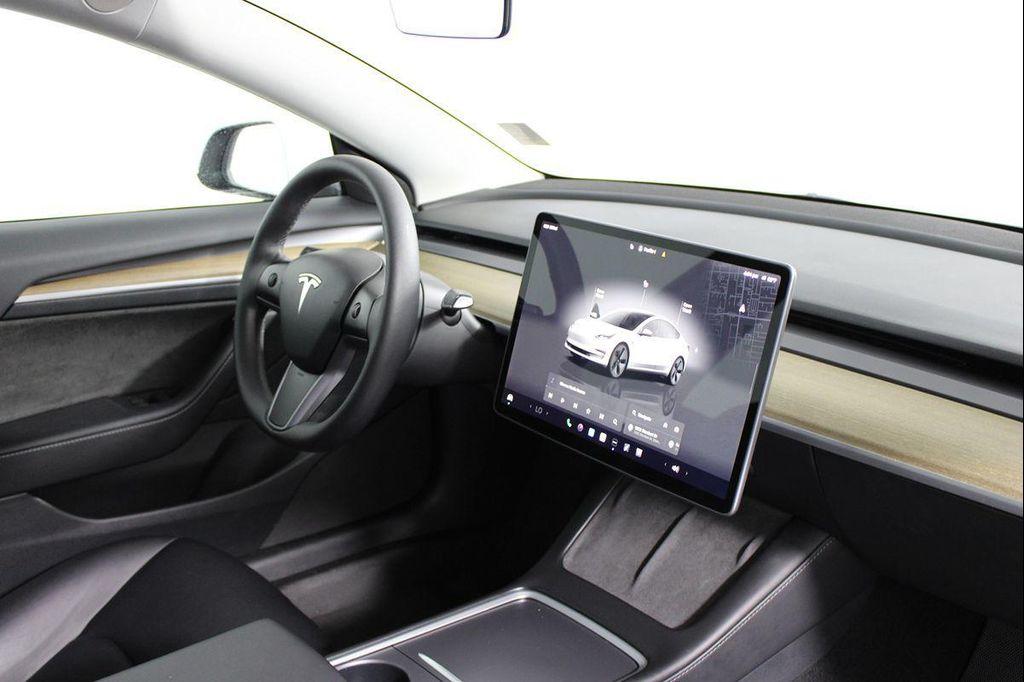 used 2023 Tesla Model 3 car, priced at $26,141