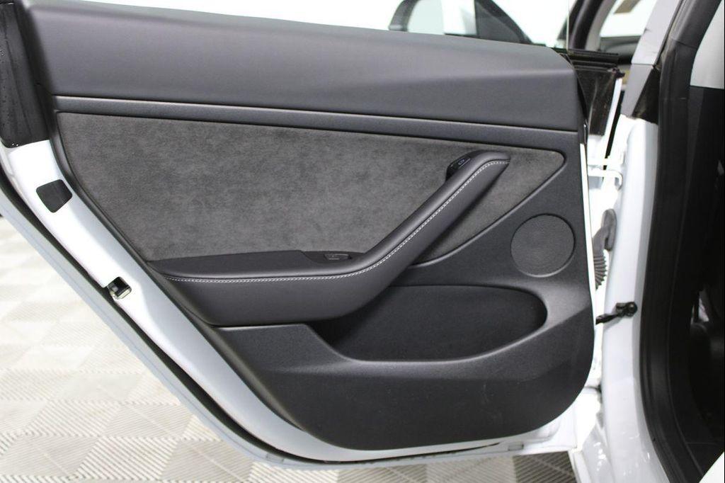 used 2023 Tesla Model 3 car, priced at $26,141