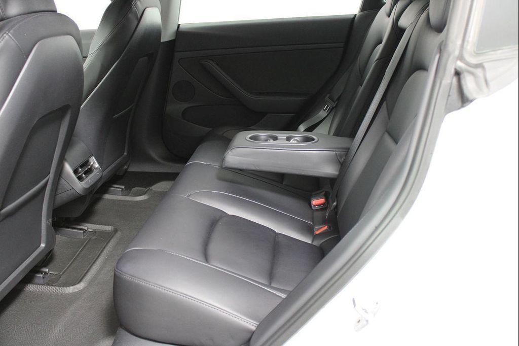 used 2023 Tesla Model 3 car, priced at $26,141