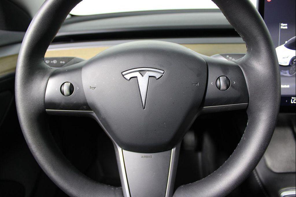 used 2023 Tesla Model 3 car, priced at $19,709