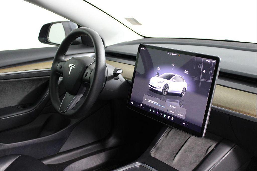 used 2023 Tesla Model 3 car, priced at $19,709