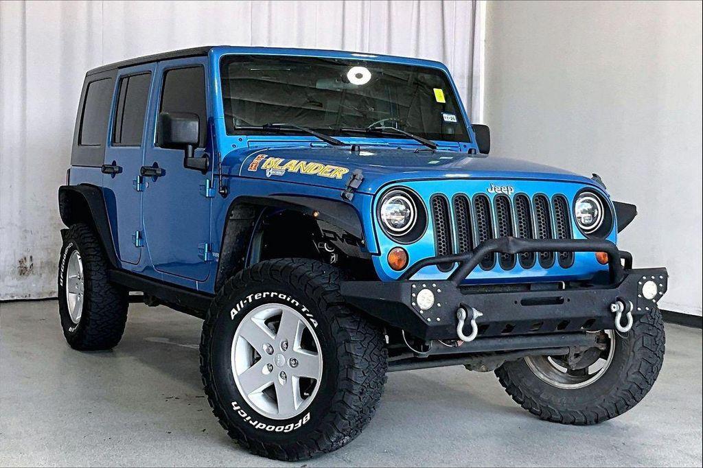 used 2010 Jeep Wrangler Unlimited car, priced at $12,216