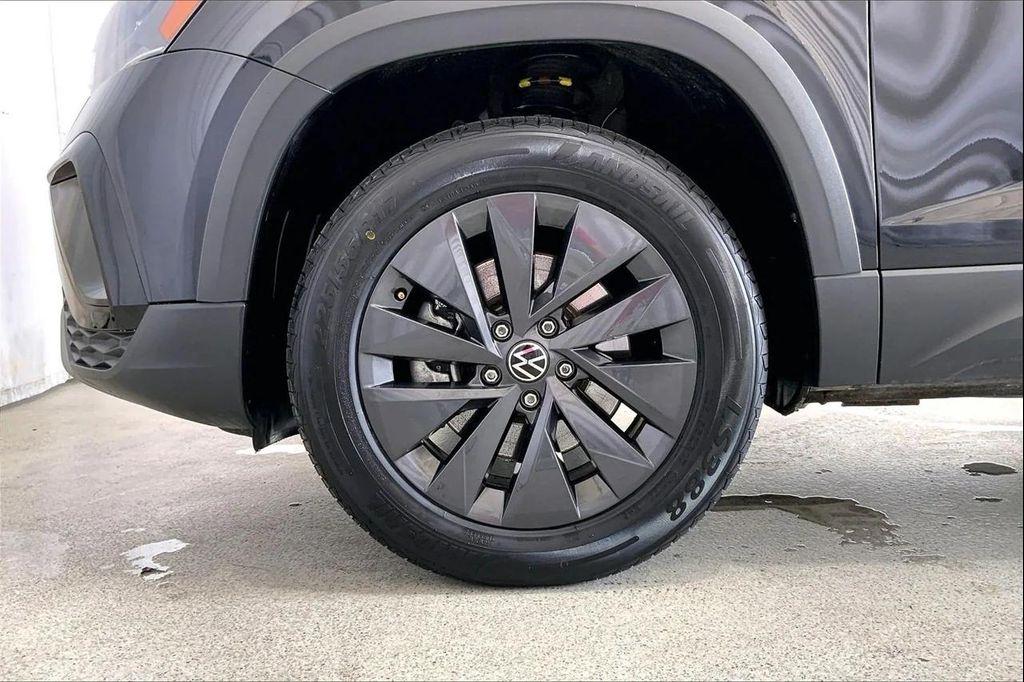 used 2023 Volkswagen Taos car, priced at $15,991