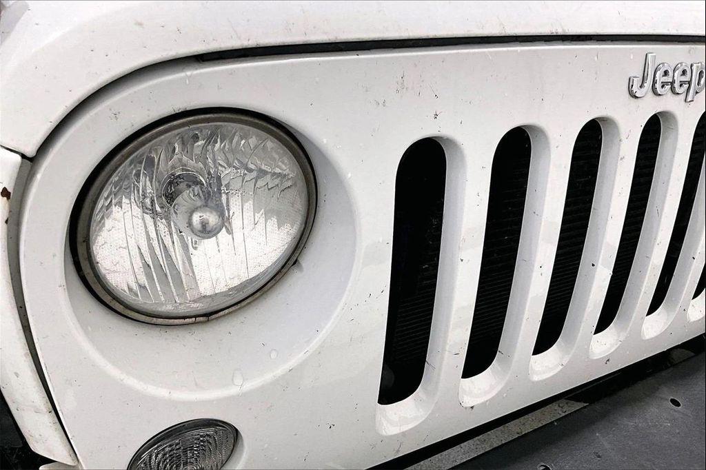 used 2018 Jeep Wrangler JK Unlimited car, priced at $14,492