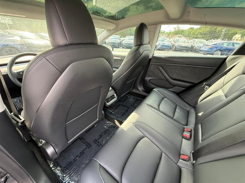 used 2023 Tesla Model 3 car, priced at $27,995