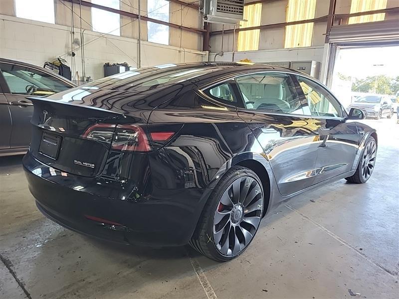 used 2023 Tesla Model 3 car, priced at $32,995