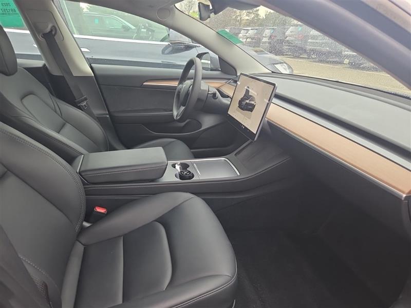 used 2023 Tesla Model 3 car, priced at $28,995