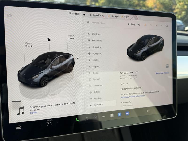 used 2024 Tesla Model Y car, priced at $36,995