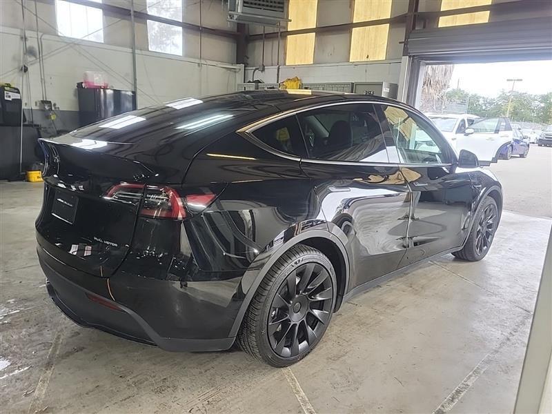 used 2023 Tesla Model Y car, priced at $34,995
