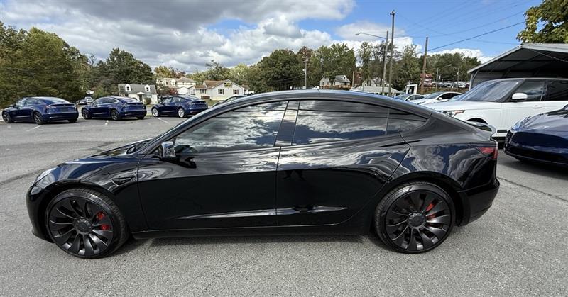 used 2023 Tesla Model 3 car, priced at $33,995