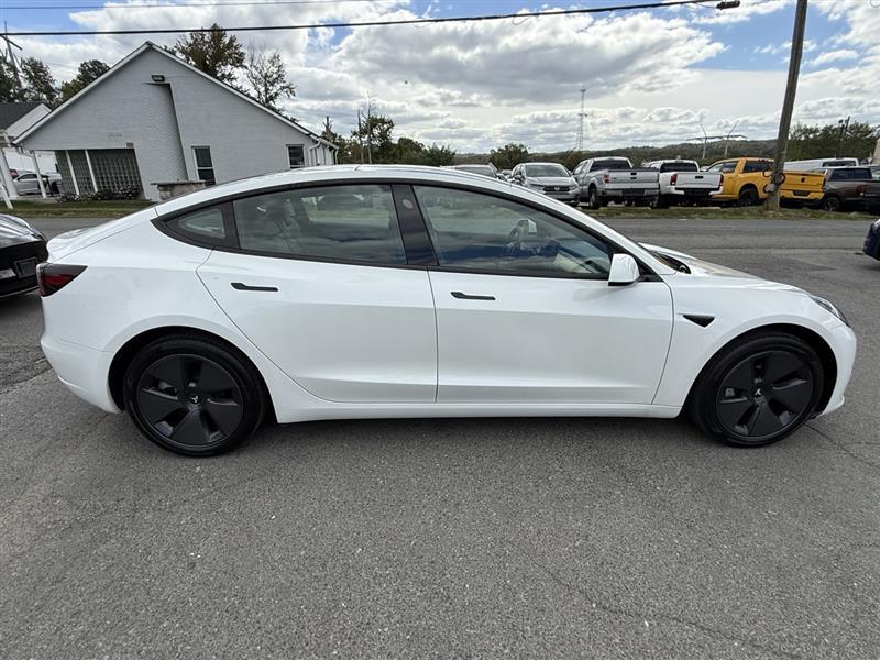 used 2023 Tesla Model 3 car, priced at $28,995