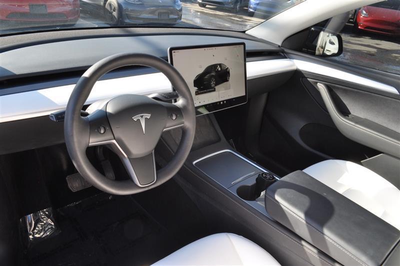 used 2023 Tesla Model Y car, priced at $32,995