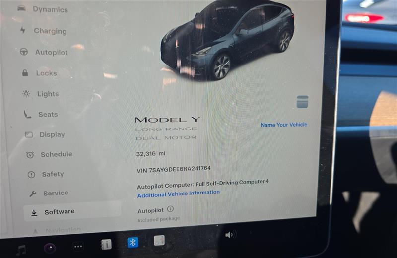 used 2024 Tesla Model Y car, priced at $35,995