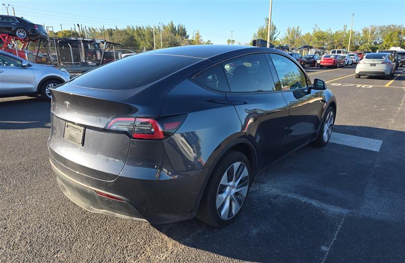 used 2024 Tesla Model Y car, priced at $35,995