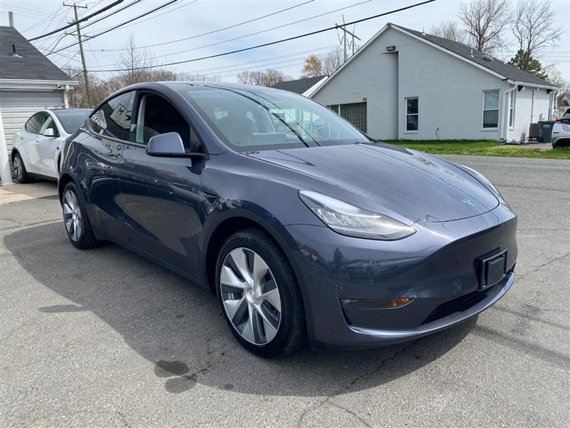 used 2024 Tesla Model Y car, priced at $34,995