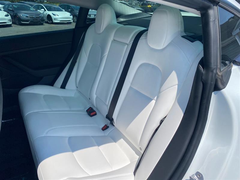 used 2023 Tesla Model 3 car, priced at $27,995