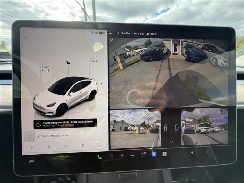 used 2024 Tesla Model Y car, priced at $33,995