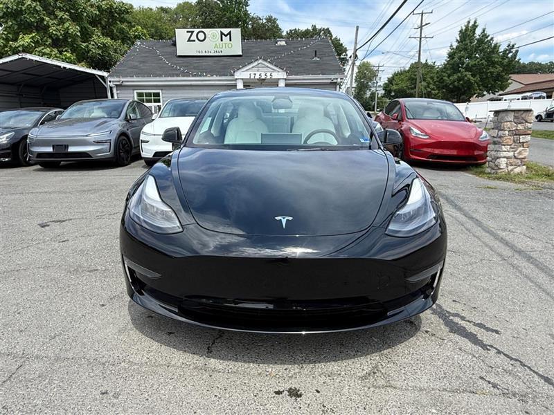 used 2023 Tesla Model 3 car, priced at $27,995