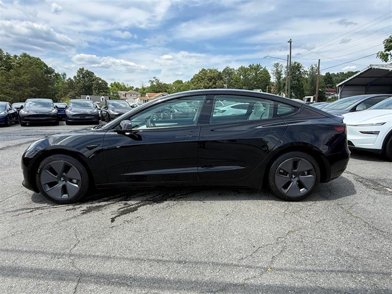used 2023 Tesla Model 3 car, priced at $27,995
