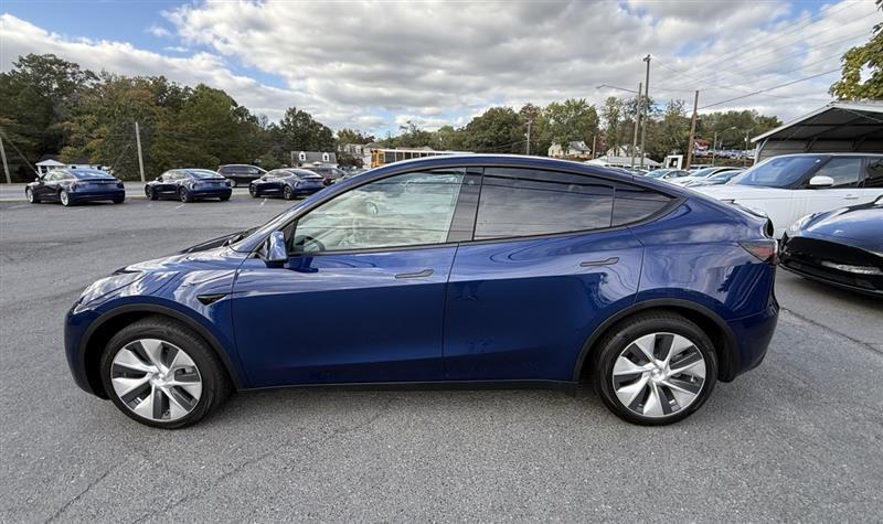 used 2023 Tesla Model Y car, priced at $32,995