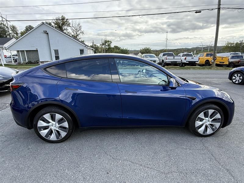 used 2023 Tesla Model Y car, priced at $32,995