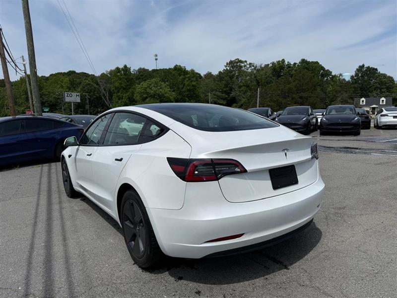 used 2023 Tesla Model 3 car, priced at $27,995