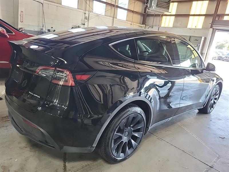 used 2023 Tesla Model Y car, priced at $32,995