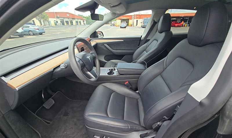 used 2023 Tesla Model Y car, priced at $34,995