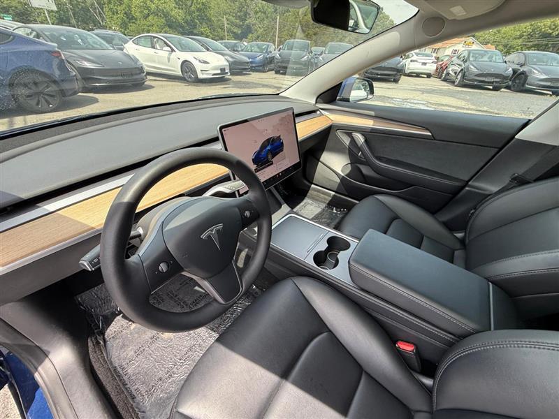 used 2023 Tesla Model 3 car, priced at $27,995